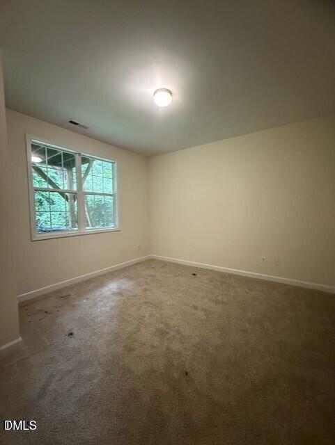 4622 Centrebrook Circle Raleigh, NC 27616 - Photo 11 of 14 an empty room with windows