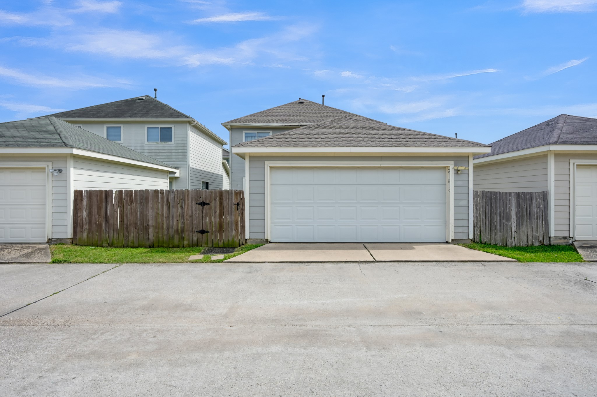 21815 Mossy Field Lane Spring, TX 77388 - Photo 37 of 39 Attached 2-car rear-entry garage with additional driveway parking and fenced yard access.