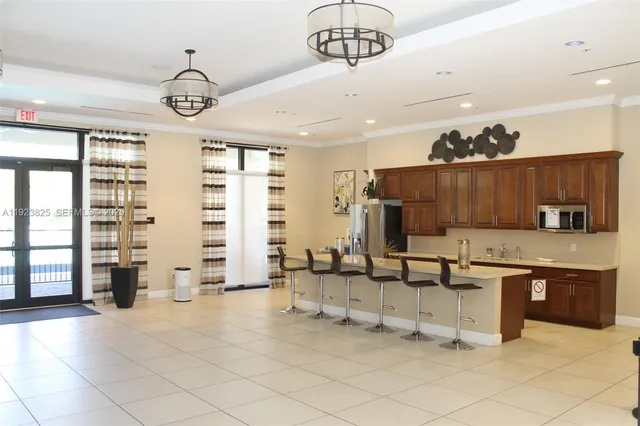 a view of kitchen with furniture and window