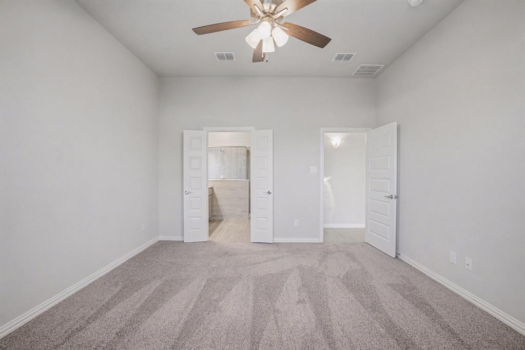 2404 Peebles Lane Denton, TX 76207 - Photo 15 of 30 a view of an empty room and window
