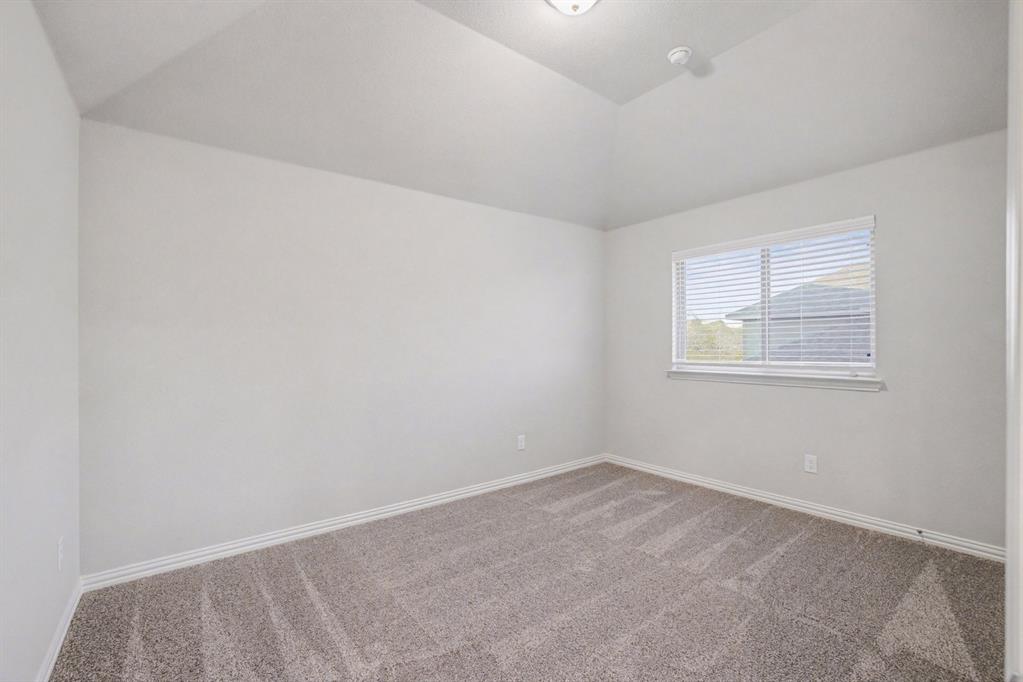2404 Peebles Lane Denton, TX 76207 - Photo 24 of 30 an empty room with windows