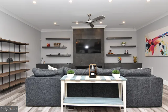 a room with furniture and view kitchen