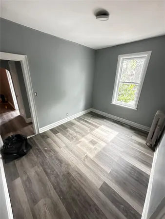 a view of an empty room and window