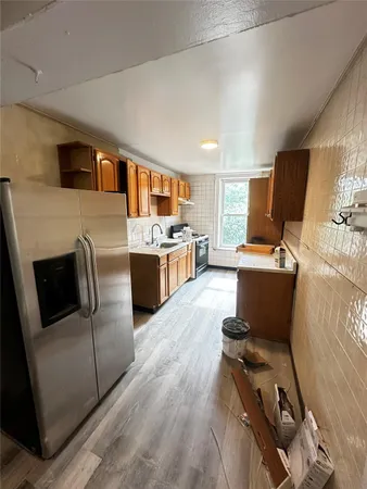 a bathroom with a sink a toilet and a bathtub