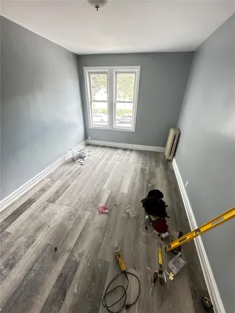 a view of livingroom with hardwood floor and window