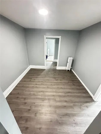 a view of an empty room and window