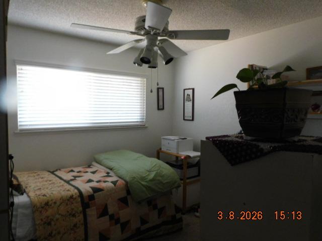 2824 Edison Avenue Sacramento, CA 95821 - Photo 13 of 21 a bedroom with a bed and furniture