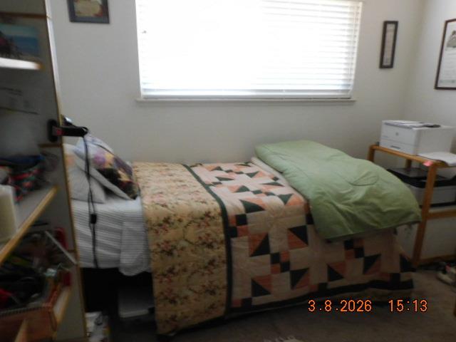2824 Edison Avenue Sacramento, CA 95821 - Photo 14 of 21 a bedroom with a bed and a window