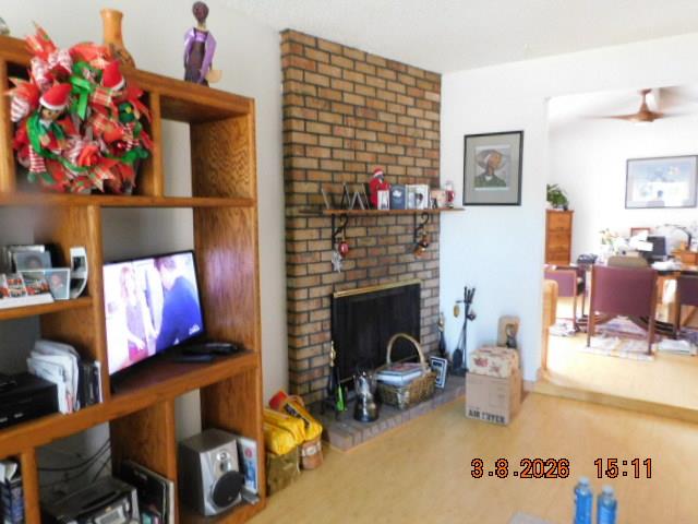 2824 Edison Avenue Sacramento, CA 95821 - Photo 2 of 21 a living room with furniture and a fireplace