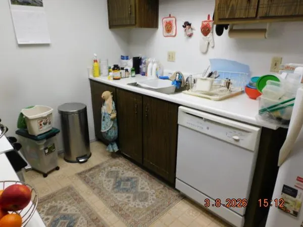a kitchen with a sink and a stove