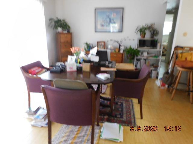 2824 Edison Avenue Sacramento, CA 95821 - Photo 10 of 21 a dining room with furniture and wooden floor