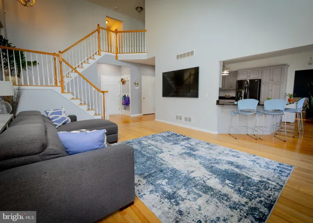 a bathroom with a tub a window and a shower