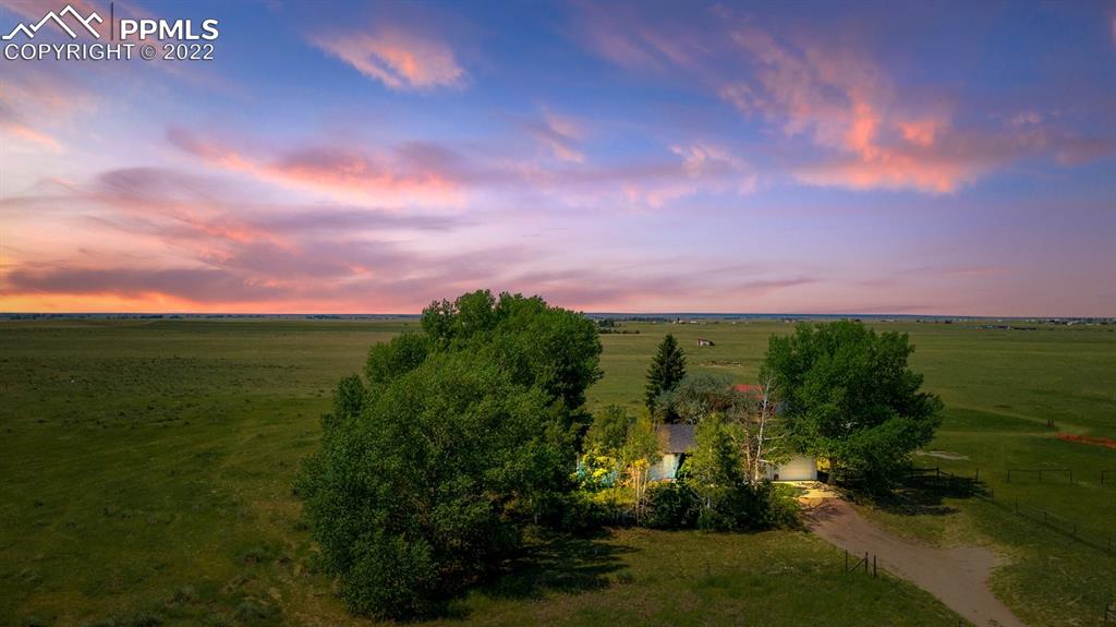 9180 McClelland Road Calhan, CO 80808 - Photo 2 of 31 a view of a city with lush green forest