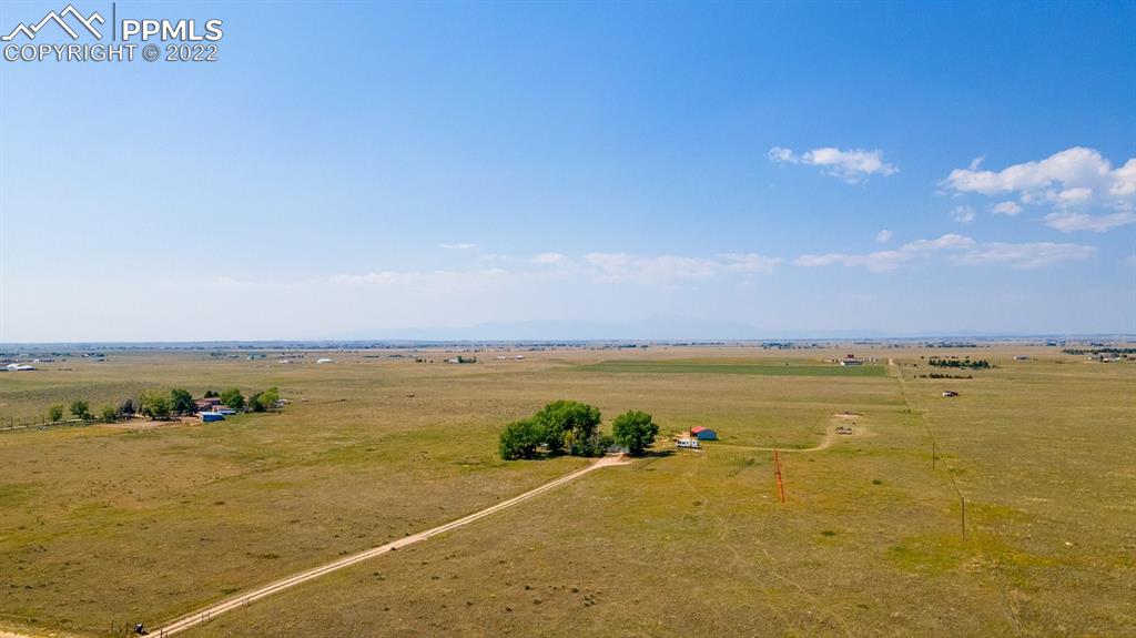 9180 McClelland Road Calhan, CO 80808 - Photo 4 of 31 a view of an ocean and beach