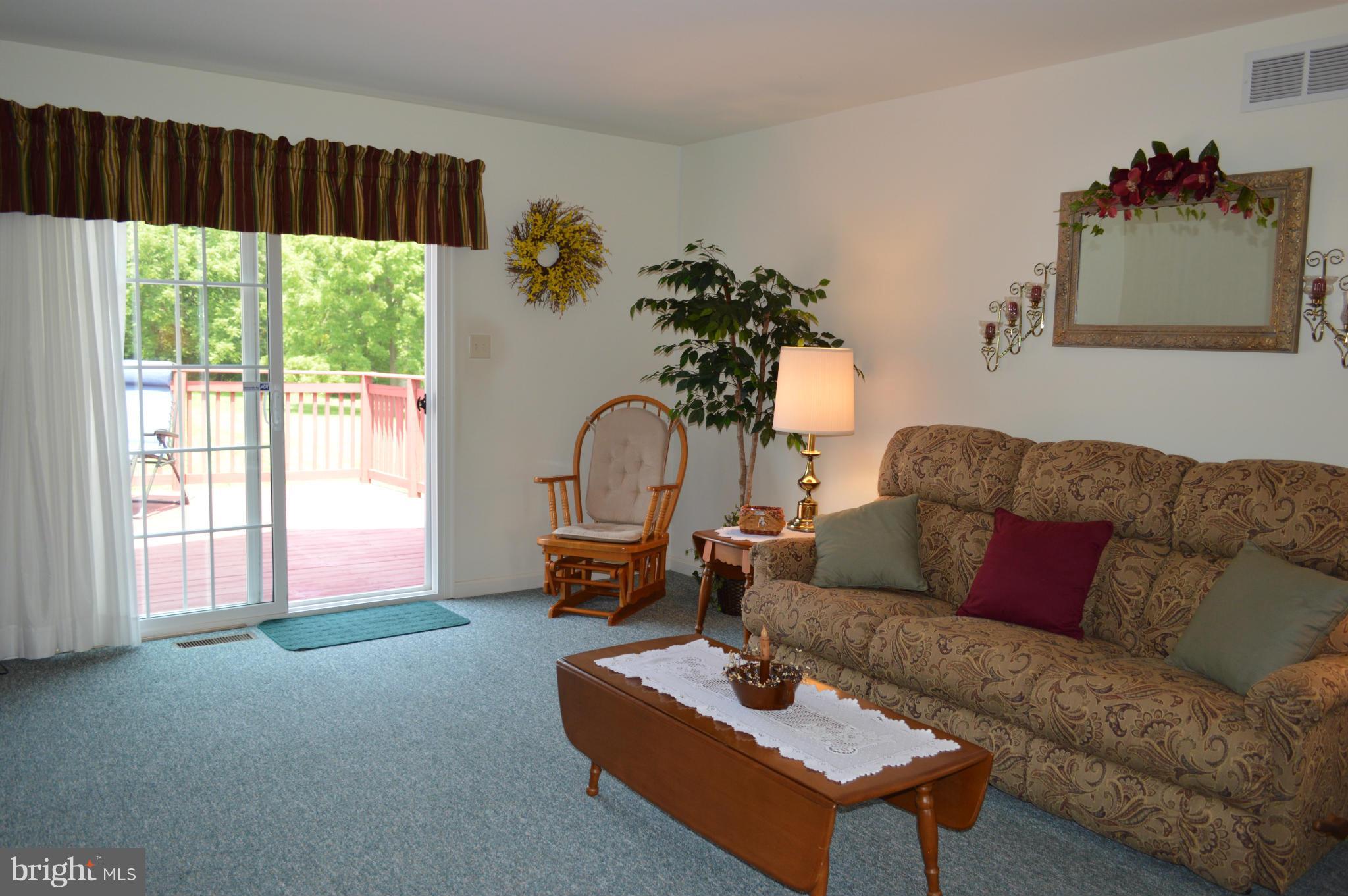 15106 Hicksville Road Clear Spring, MD 21722 - Photo 9 of 30 FAMILY ROOM WITH DECK ACCESS