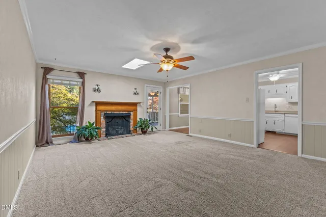 an empty room with closet and entryway