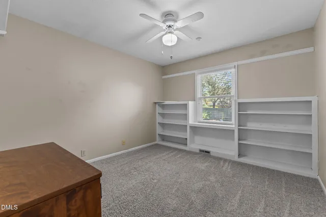 a view of a livingroom with a large window