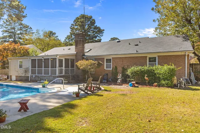 a view of a house with a small yard