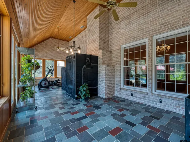 a view of a lounge chairs in the patio