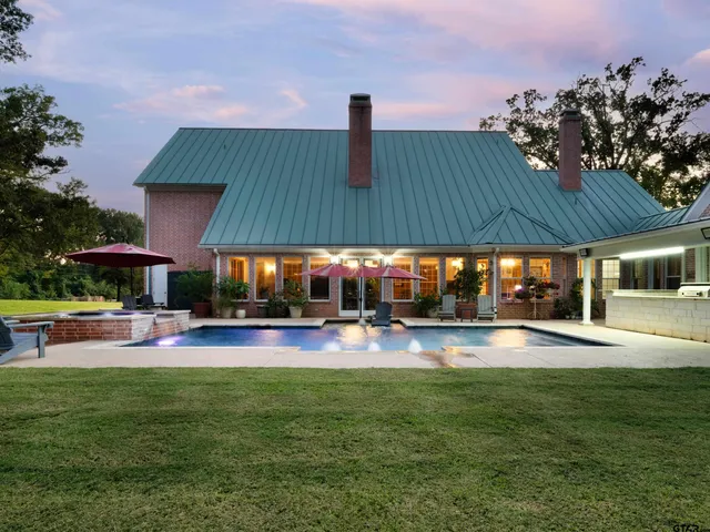 a view of a house with a swimming pool