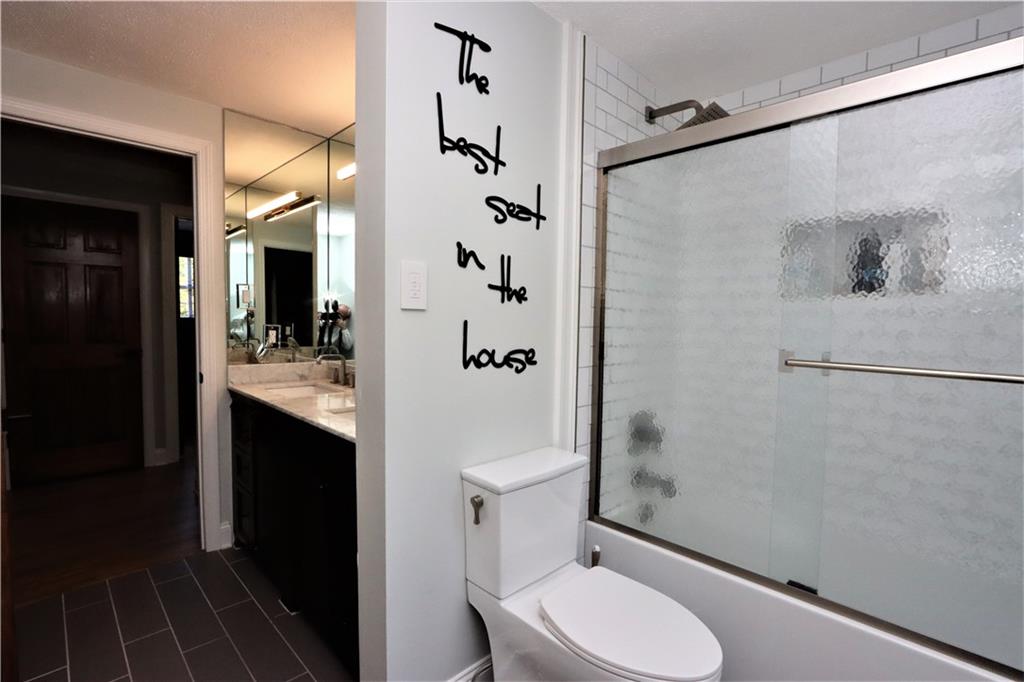 169 Mary Reed Road Baden, PA 15005 - Photo 12 of 24 a bathroom with a sink a toilet and shower
