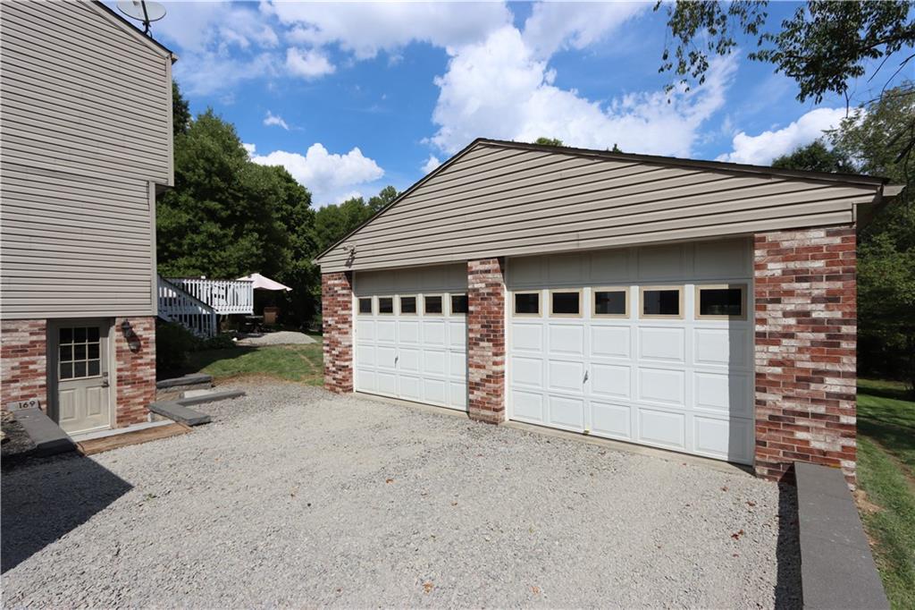 169 Mary Reed Road Baden, PA 15005 - Photo 18 of 24 a view of a house with a yard