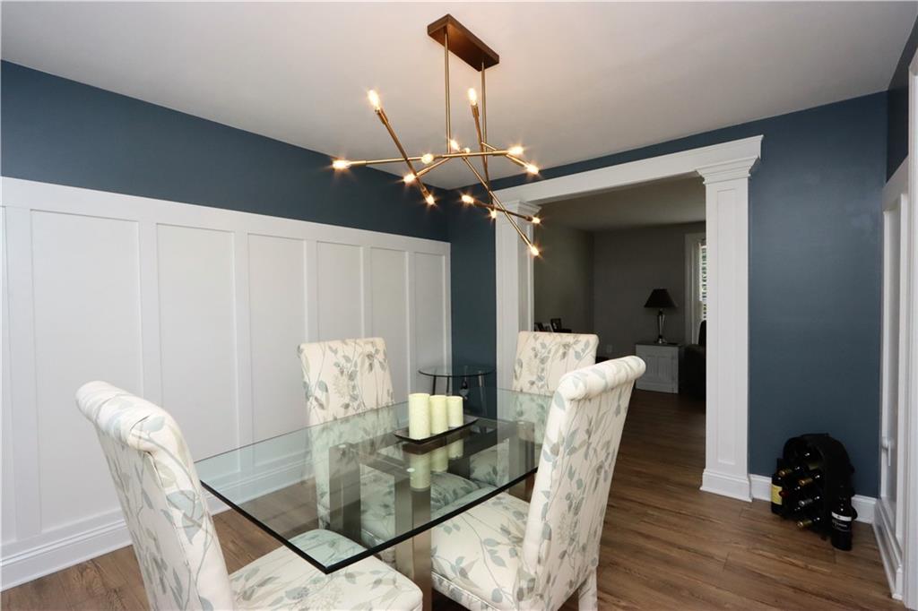 169 Mary Reed Road Baden, PA 15005 - Photo 5 of 24 a view of a dining room with furniture and wooden floor