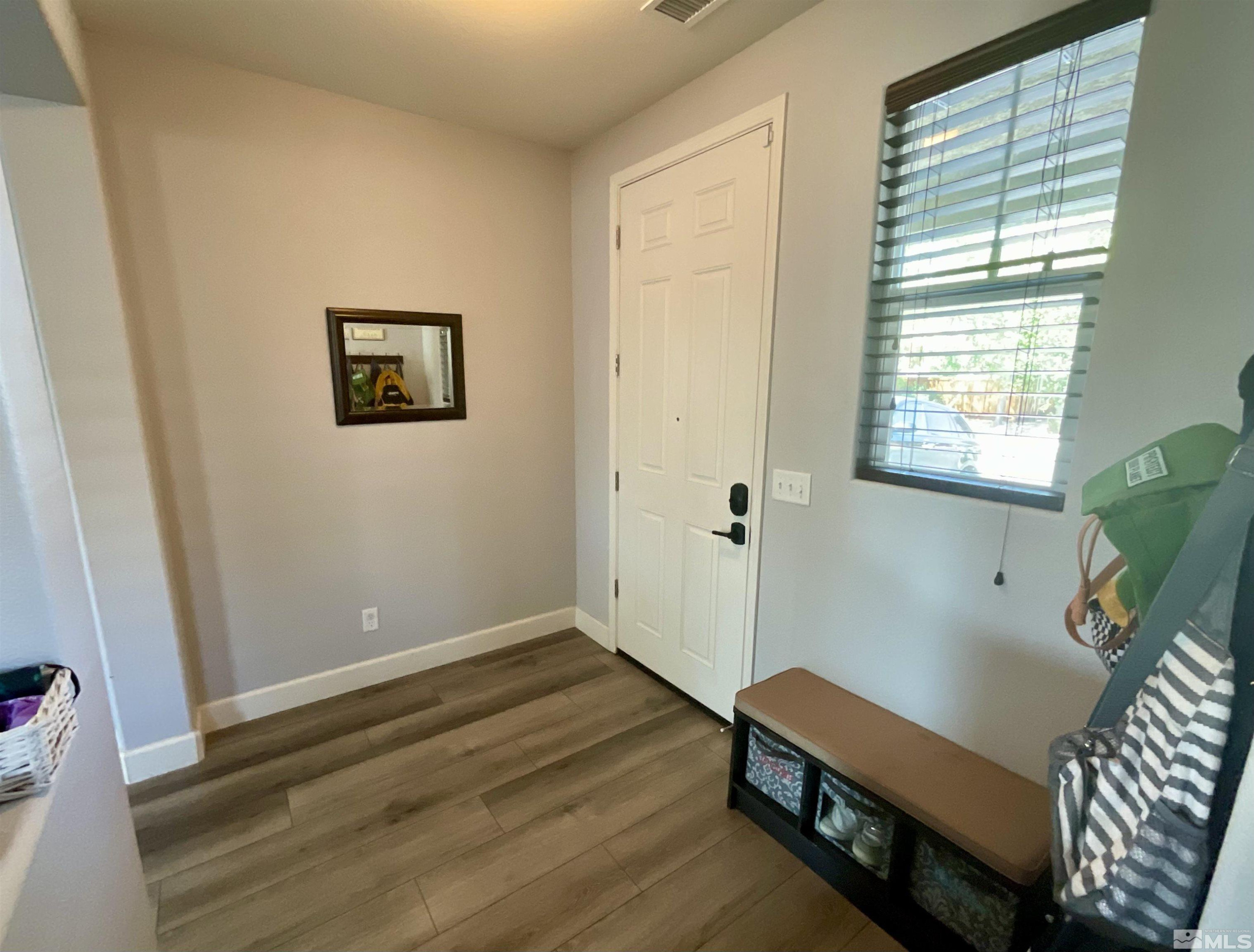 11640 Cervino Drive Reno, NV 89521 - Photo 2 of 26 a room with a bed and a window
