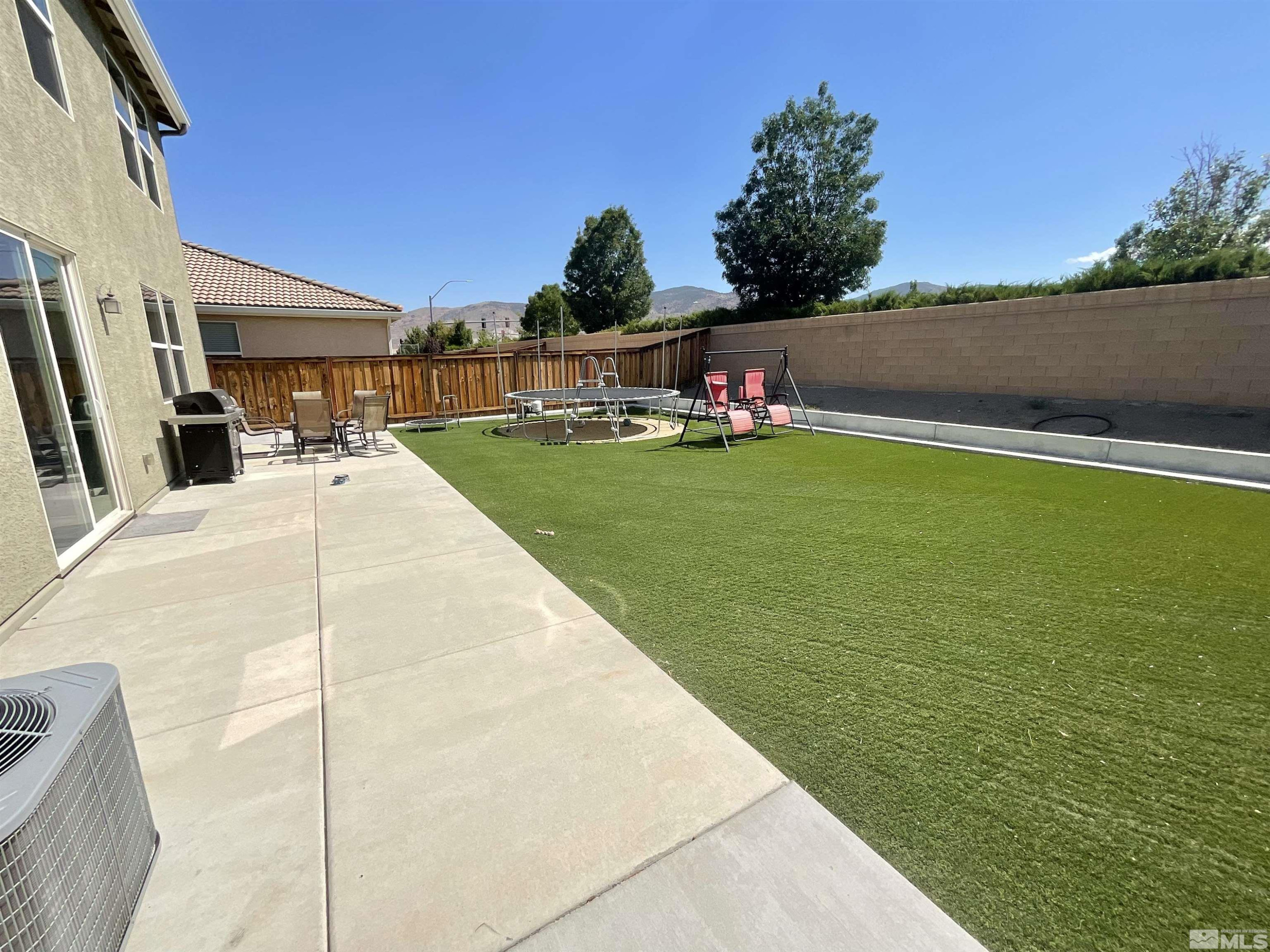 11640 Cervino Drive Reno, NV 89521 - Photo 23 of 26 a view of swimming pool with outdoor seating