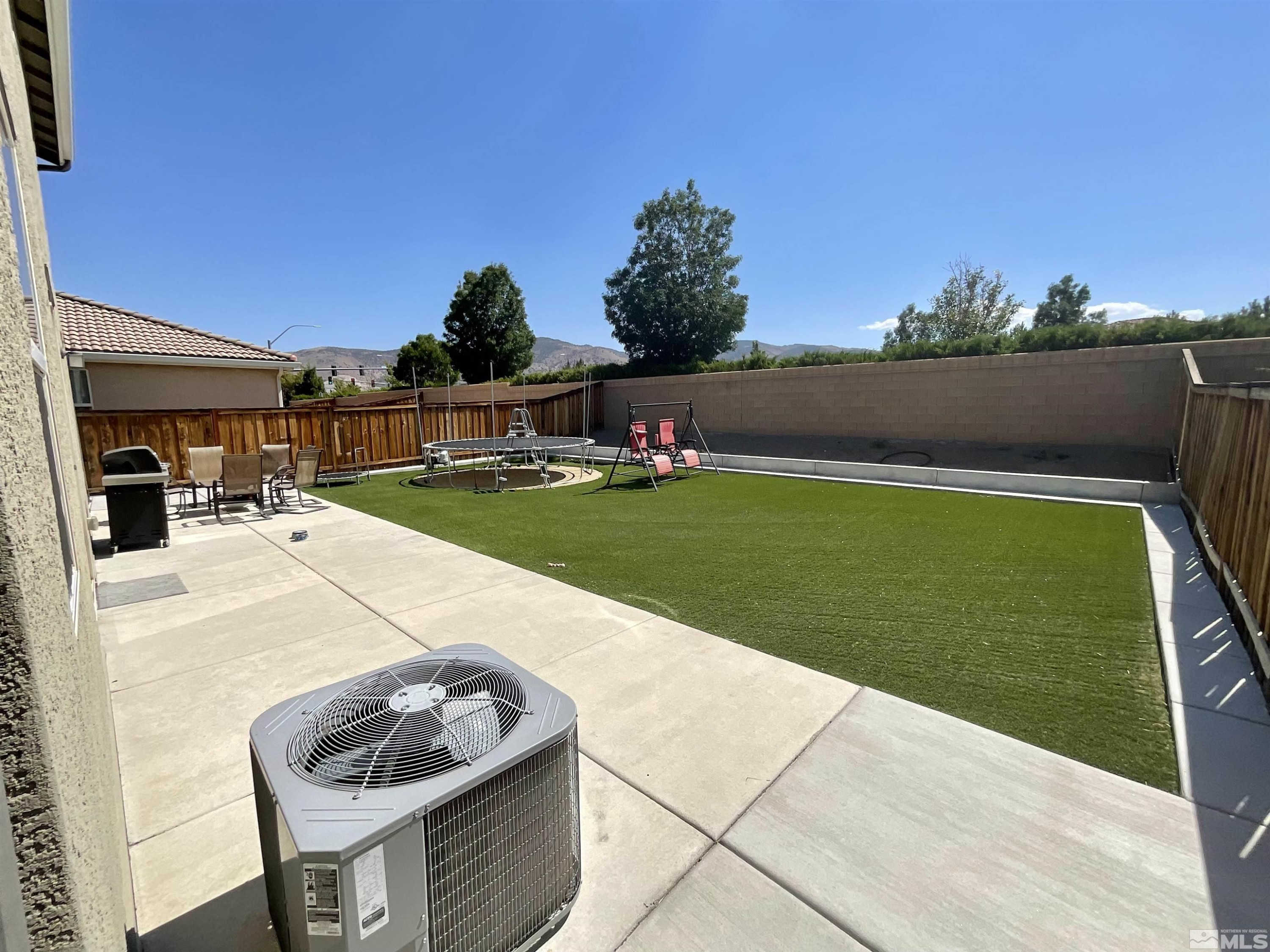 11640 Cervino Drive Reno, NV 89521 - Photo 24 of 26 a swimming pool with barbeque oven in front of it