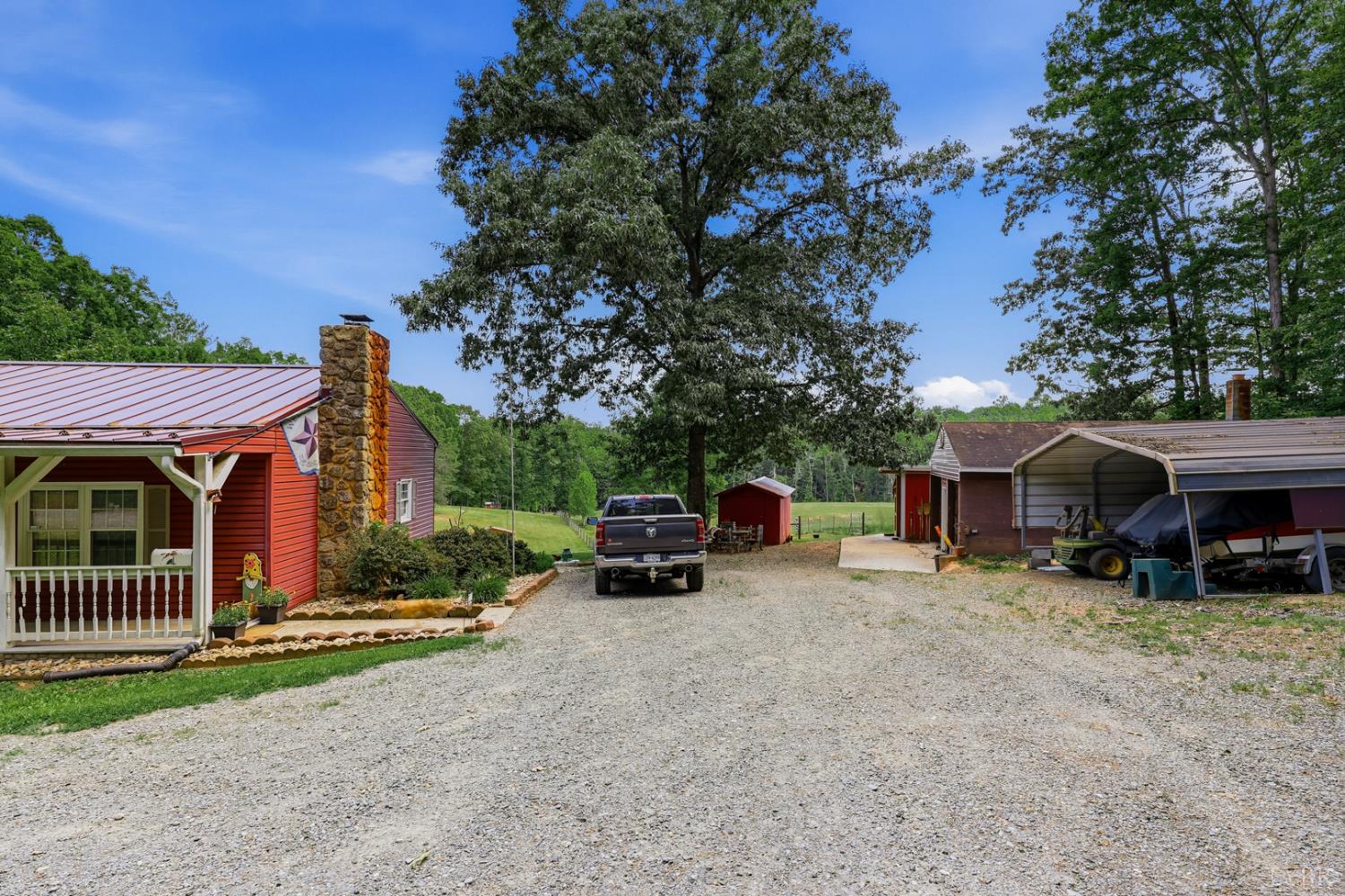 809 Plantation Road Amherst, VA 24521 - Photo 45 of 77 a view of a house with a yard and sitting area