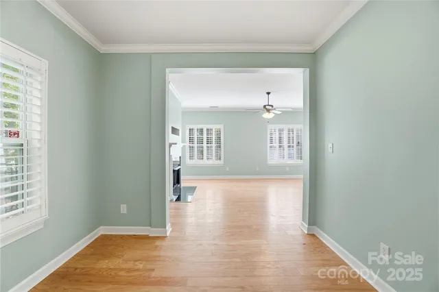 a view of an empty room and window