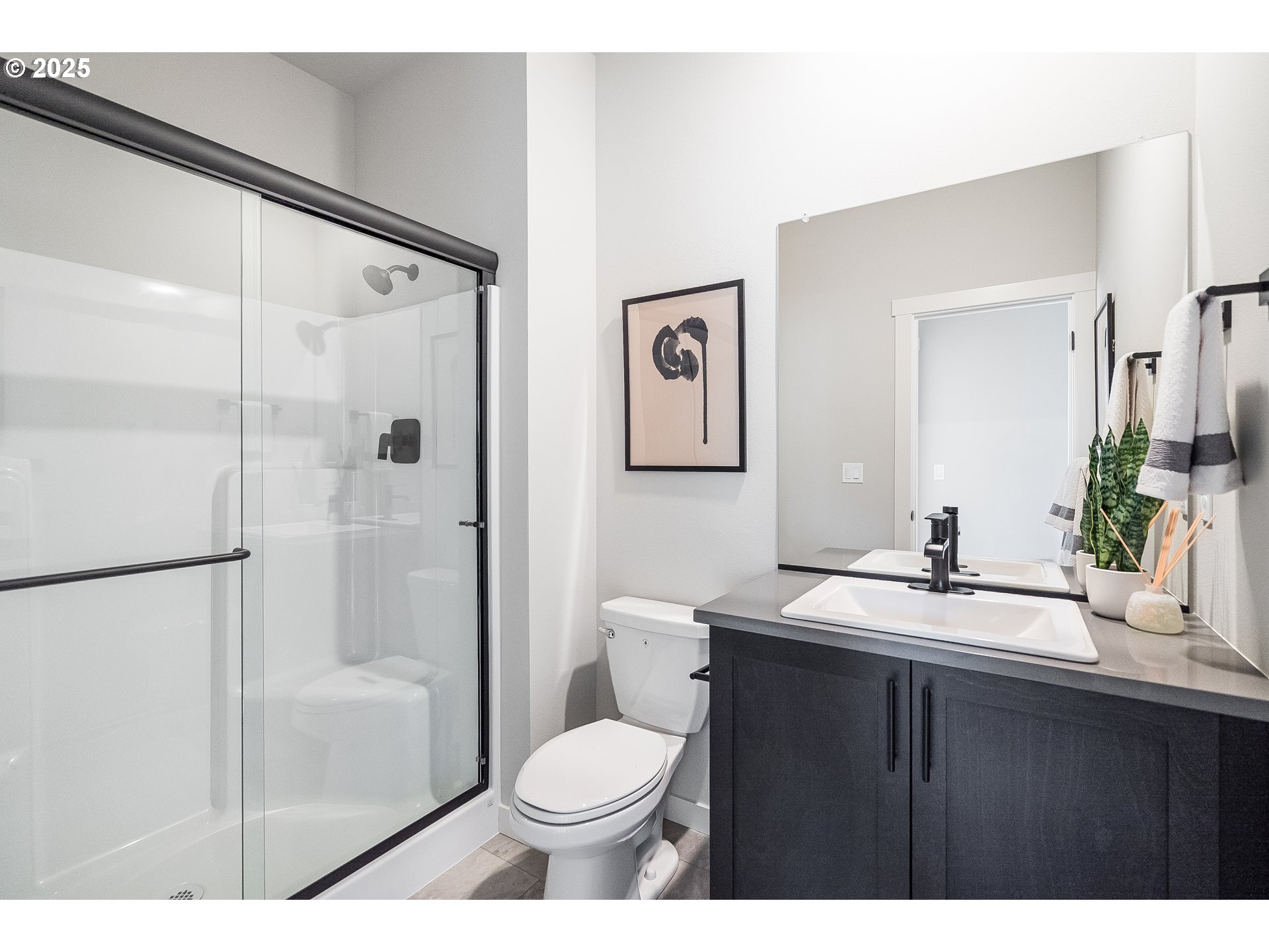 5562 North 88th Avenue Camas, WA 98607 - Photo 47 of 48 a bathroom with a sink toilet and shower