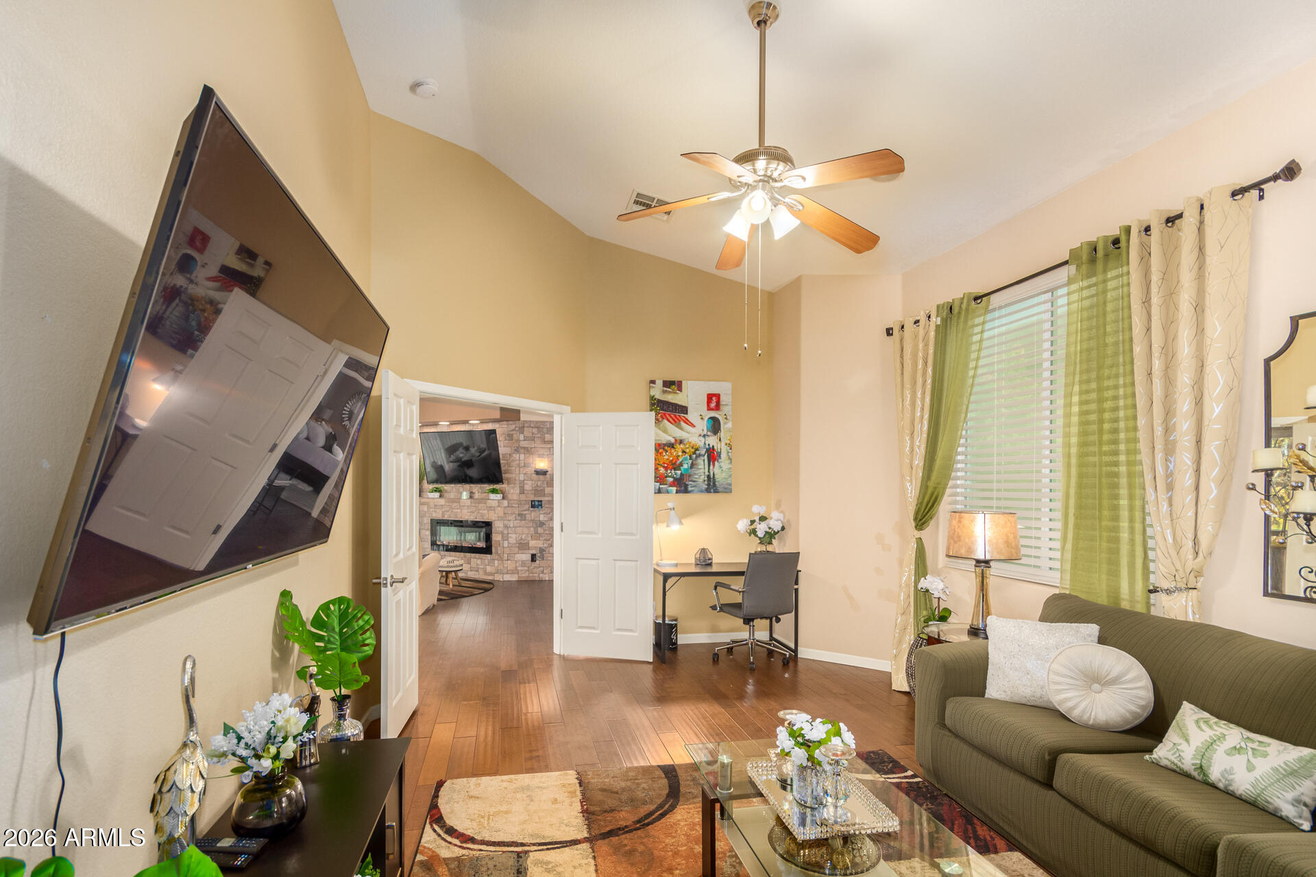 3341 East Fremont Road Phoenix, AZ 85042 - Photo 12 of 40 a living room with furniture and a large window