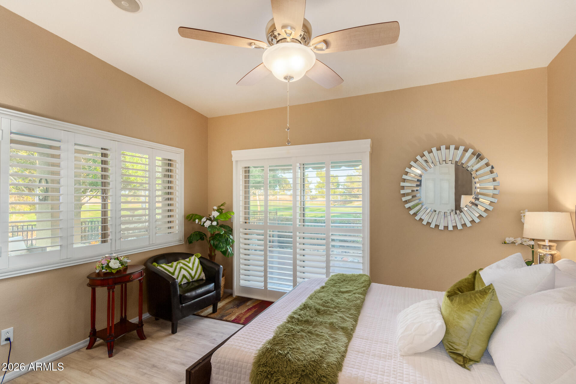 3341 East Fremont Road Phoenix, AZ 85042 - Photo 17 of 40 a bedroom with furniture and a large window