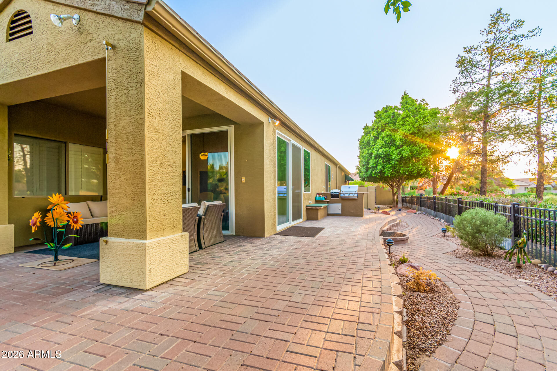 3341 East Fremont Road Phoenix, AZ 85042 - Photo 36 of 40 a view of a house with backyard and sitting area