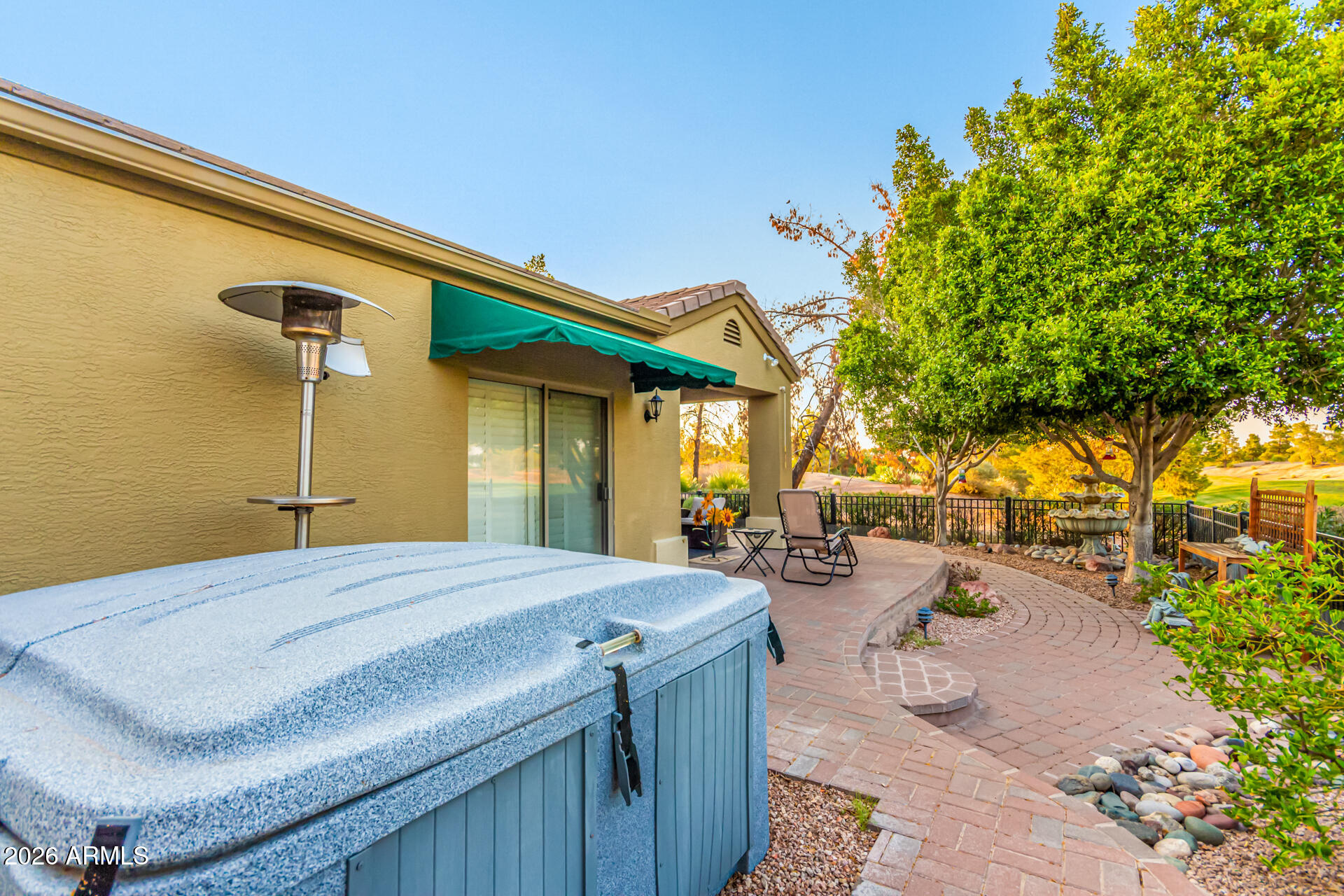 3341 East Fremont Road Phoenix, AZ 85042 - Photo 38 of 40 a view of a backyard with a patio and fire pit