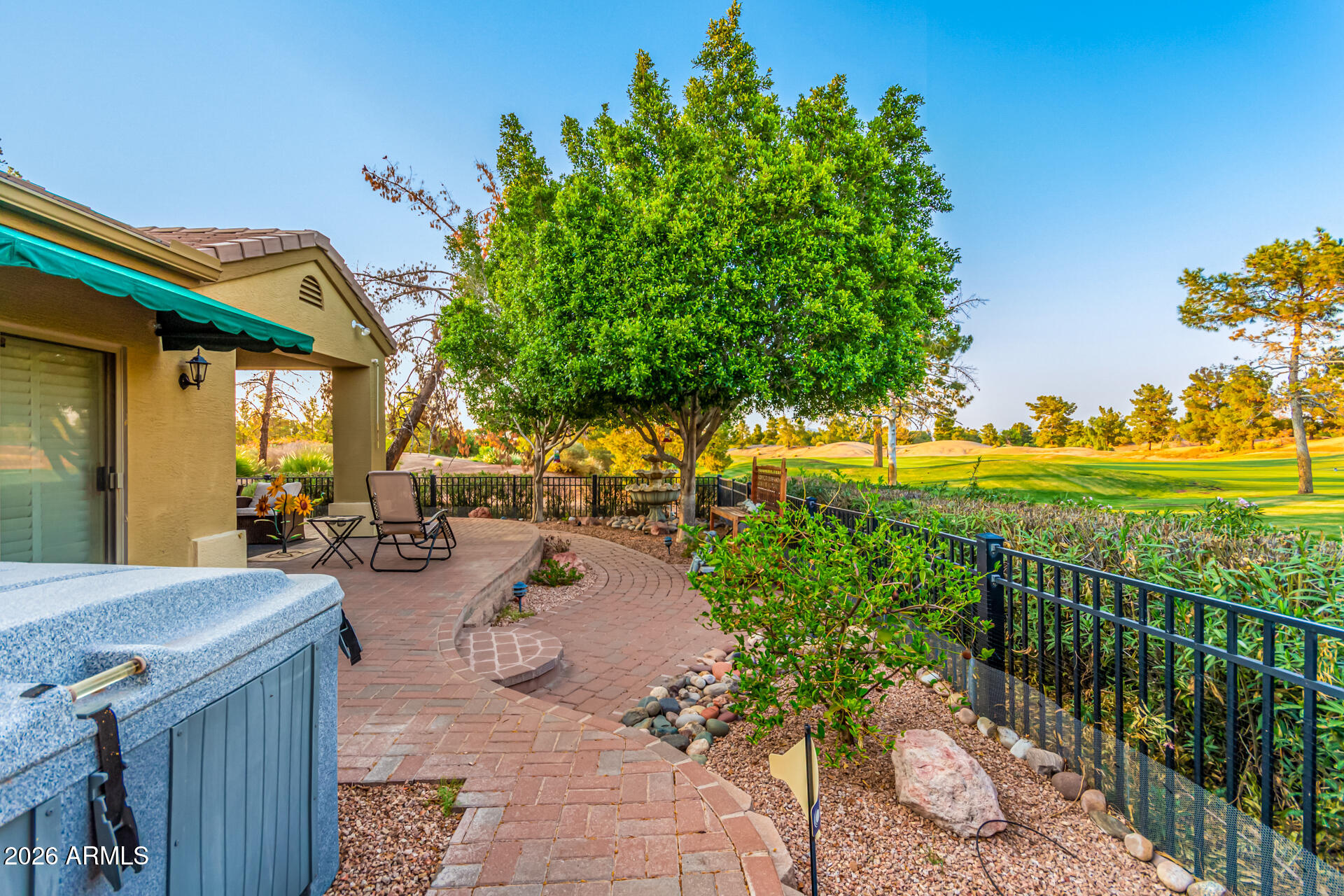 3341 East Fremont Road Phoenix, AZ 85042 - Photo 39 of 40 a view of a house with a yard and sitting area