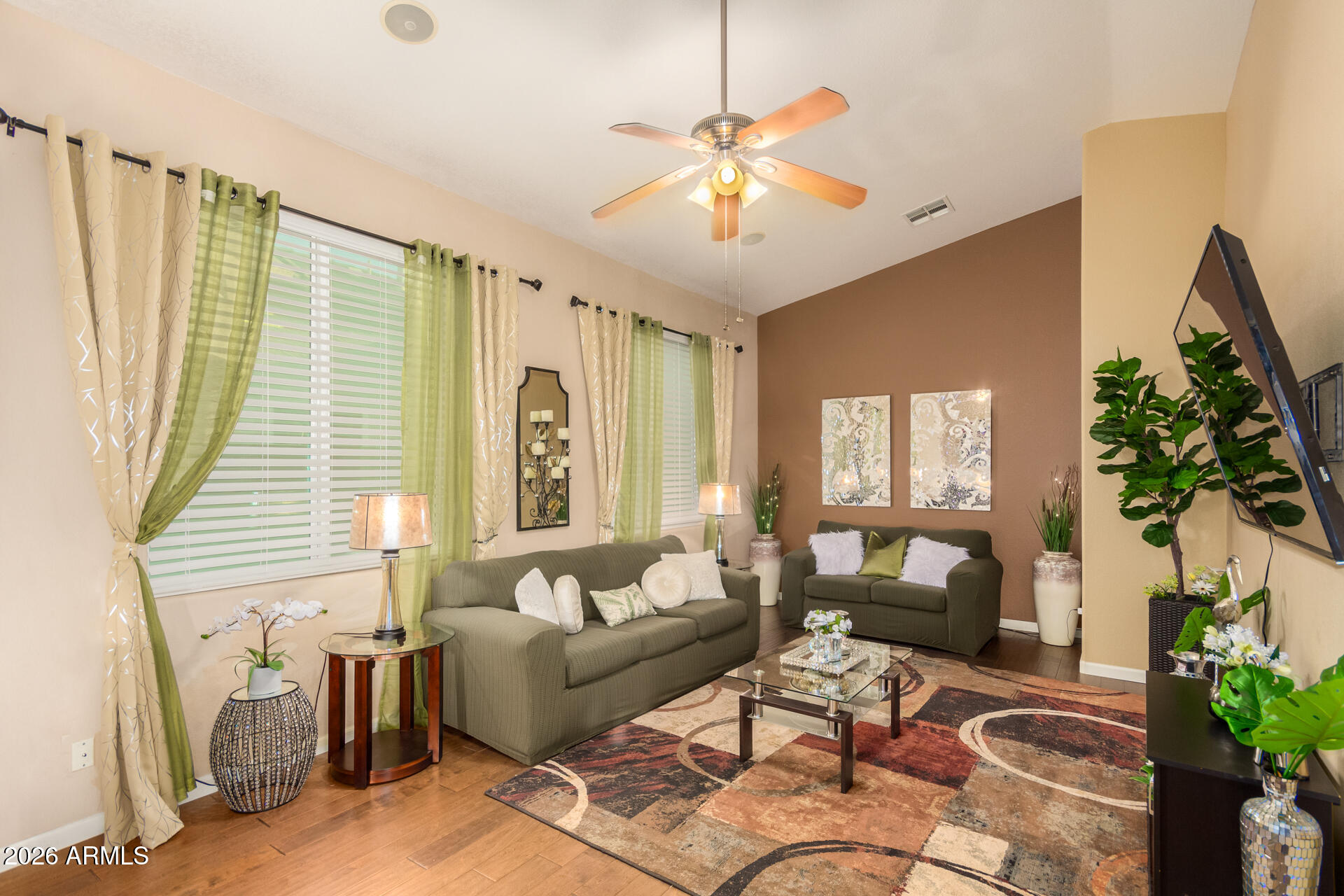 3341 East Fremont Road Phoenix, AZ 85042 - Photo 10 of 40 a living room with furniture and a large window