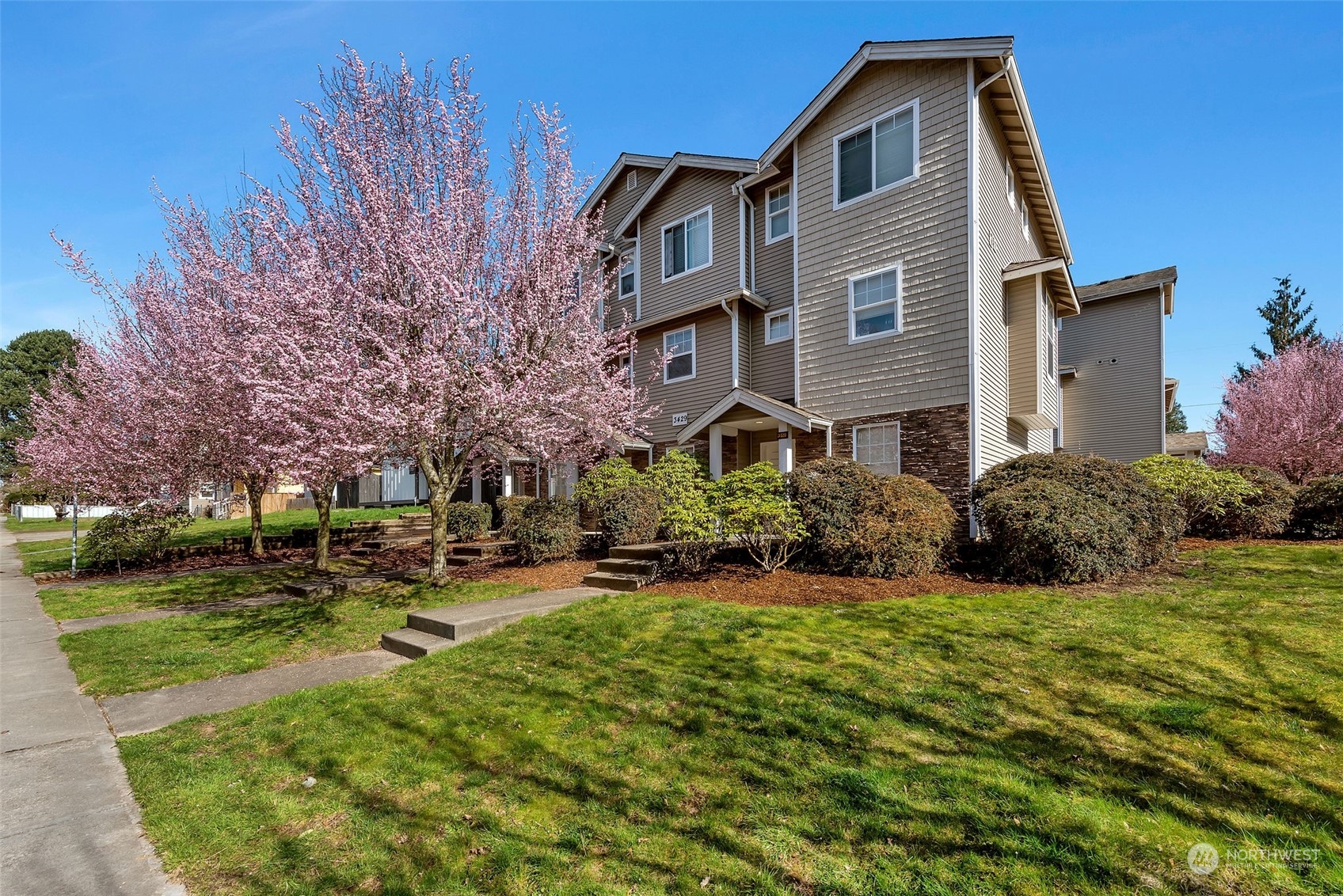 3429 Wetmore Avenue Everett, WA 98201 - Photo 11 of 19 a front view of a house with a yard