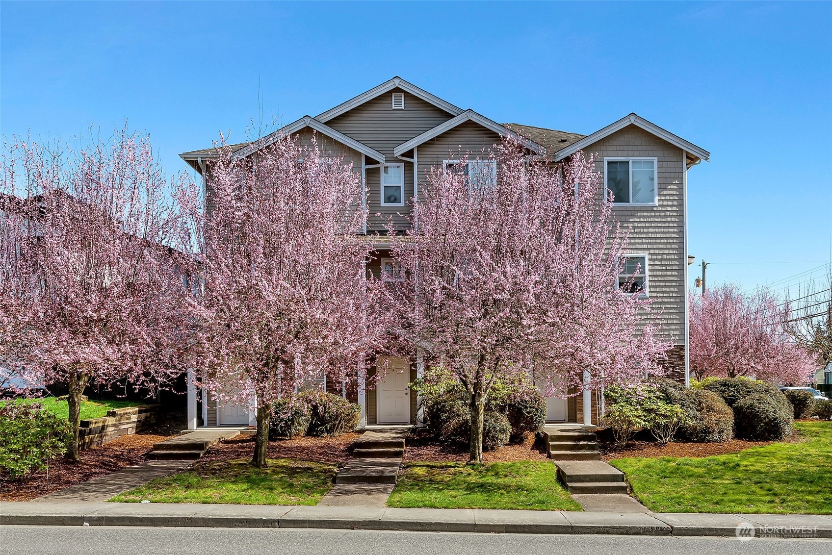 3429 Wetmore Avenue Everett, WA 98201 - Photo 17 of 19 a front view of a house with garden