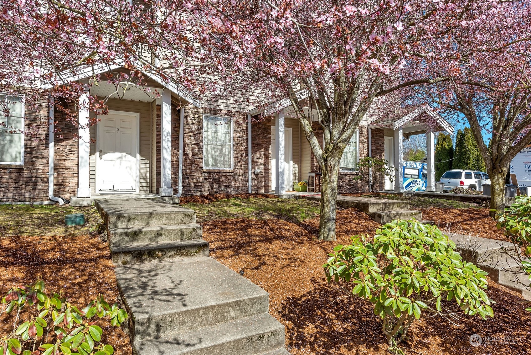 3429 Wetmore Avenue Everett, WA 98201 - Photo 10 of 19 a front view of a house with a yard