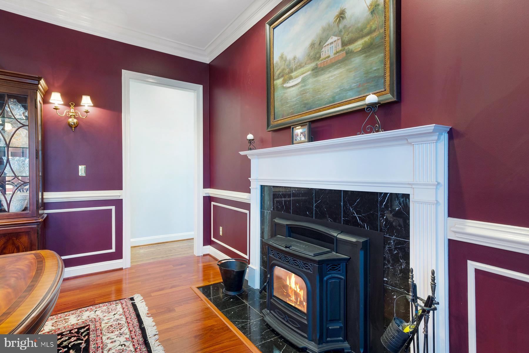 3057 Rundelac Road Annapolis, MD 21403 - Photo 15 of 61 Formal dining room has a cozy pellet stove