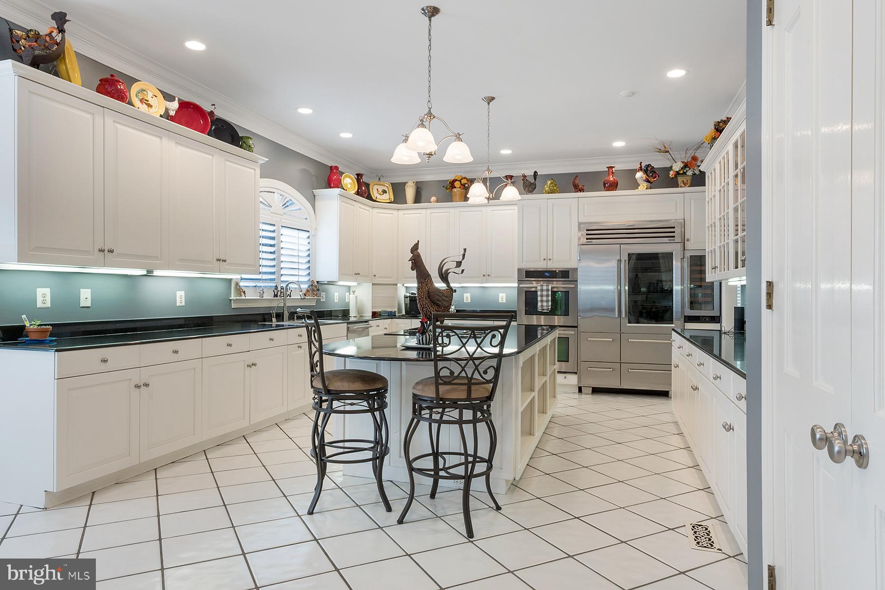 3057 Rundelac Road Annapolis, MD 21403 - Photo 23 of 61 Kitchen has a breakfast bar at center island