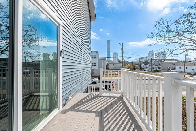 a balcony view with a sink