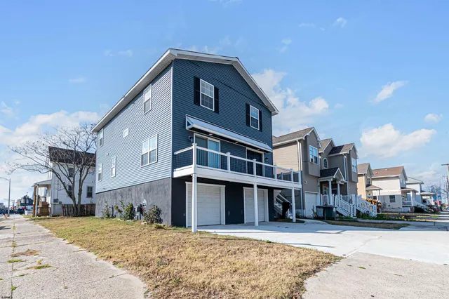 a front view of a building with a road