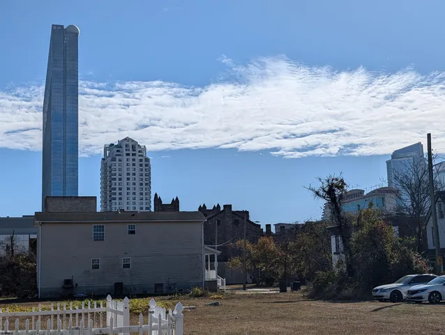 a view of a building with sitting area