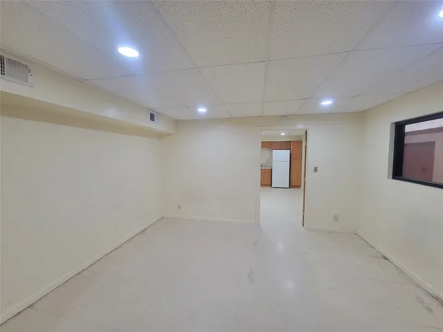 a bathroom with a double vanity sink toilet and shower
