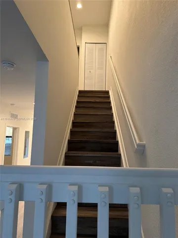 a bathroom with a toilet a sink and bathtub