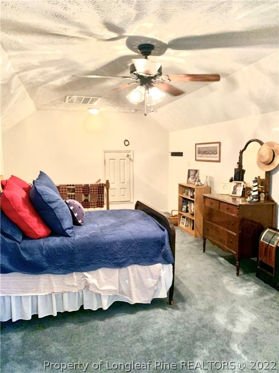 4481 Virsalli Loop Hope Mills, NC 28348 - Photo 16 of 24 a bed room with furniture and decor